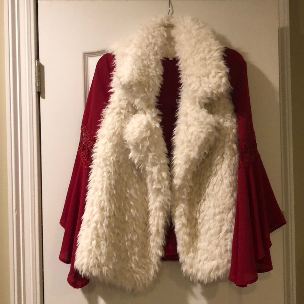Beautiful soft fluffy white cozy vest.